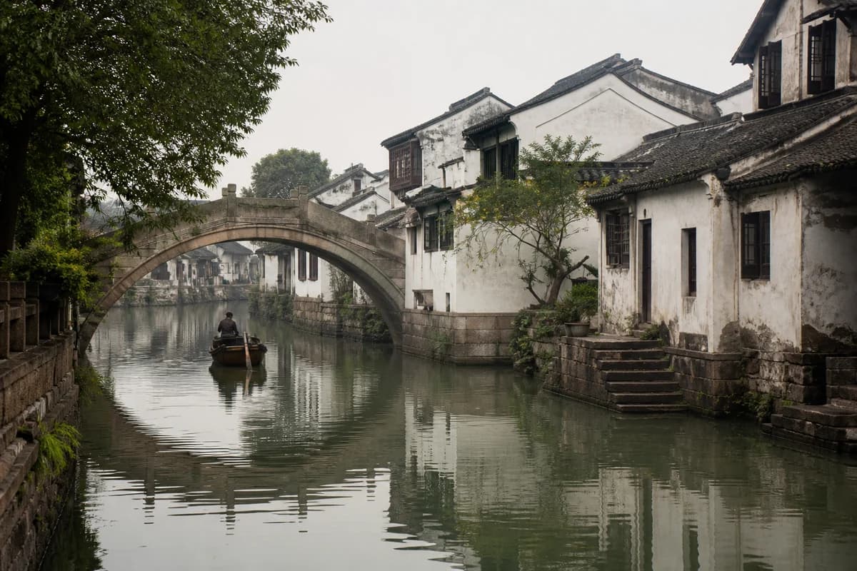 A quiet canal and stone bridge in Suzhou
