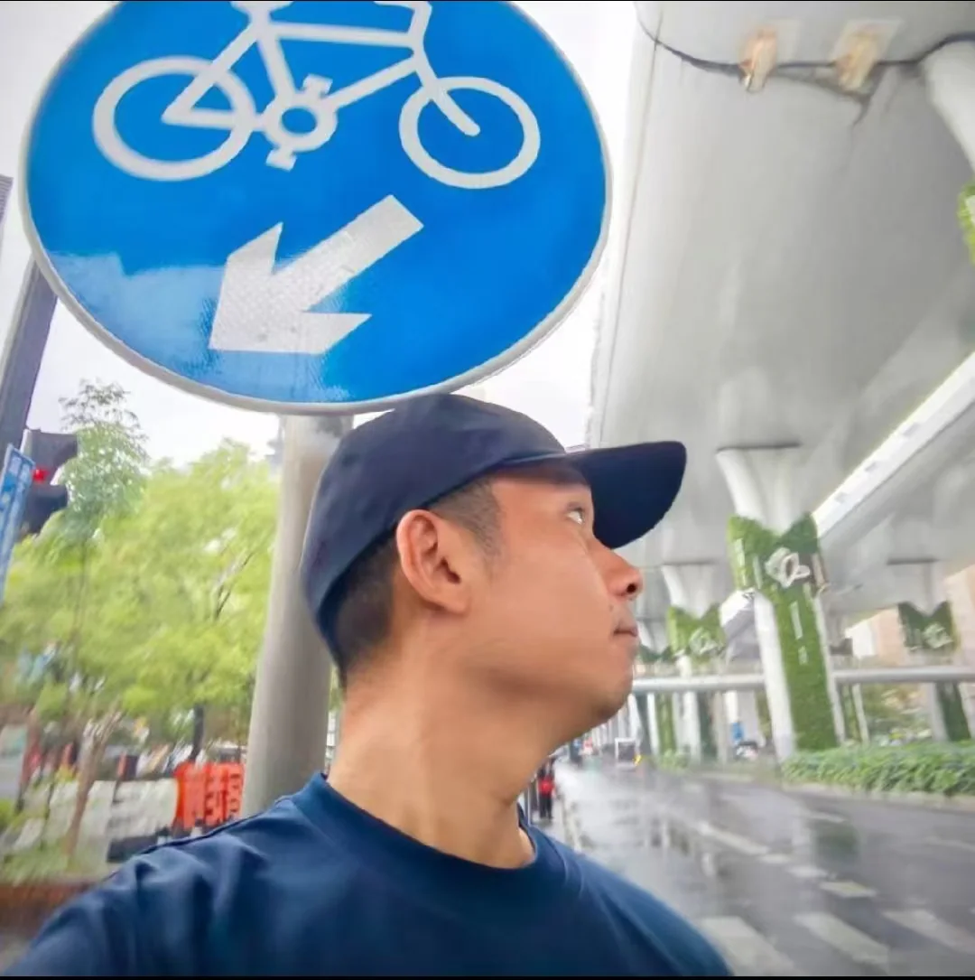 Color portrait of Wiko walking in a Chinese city, Yezai co-founder