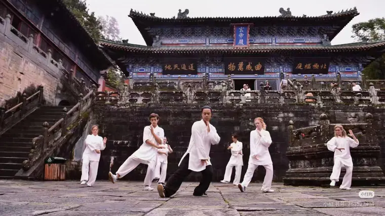 Participants practising together outside a Wudang temple